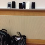 Cell phones and bags up front. Cause supposedly they are bad for testing.